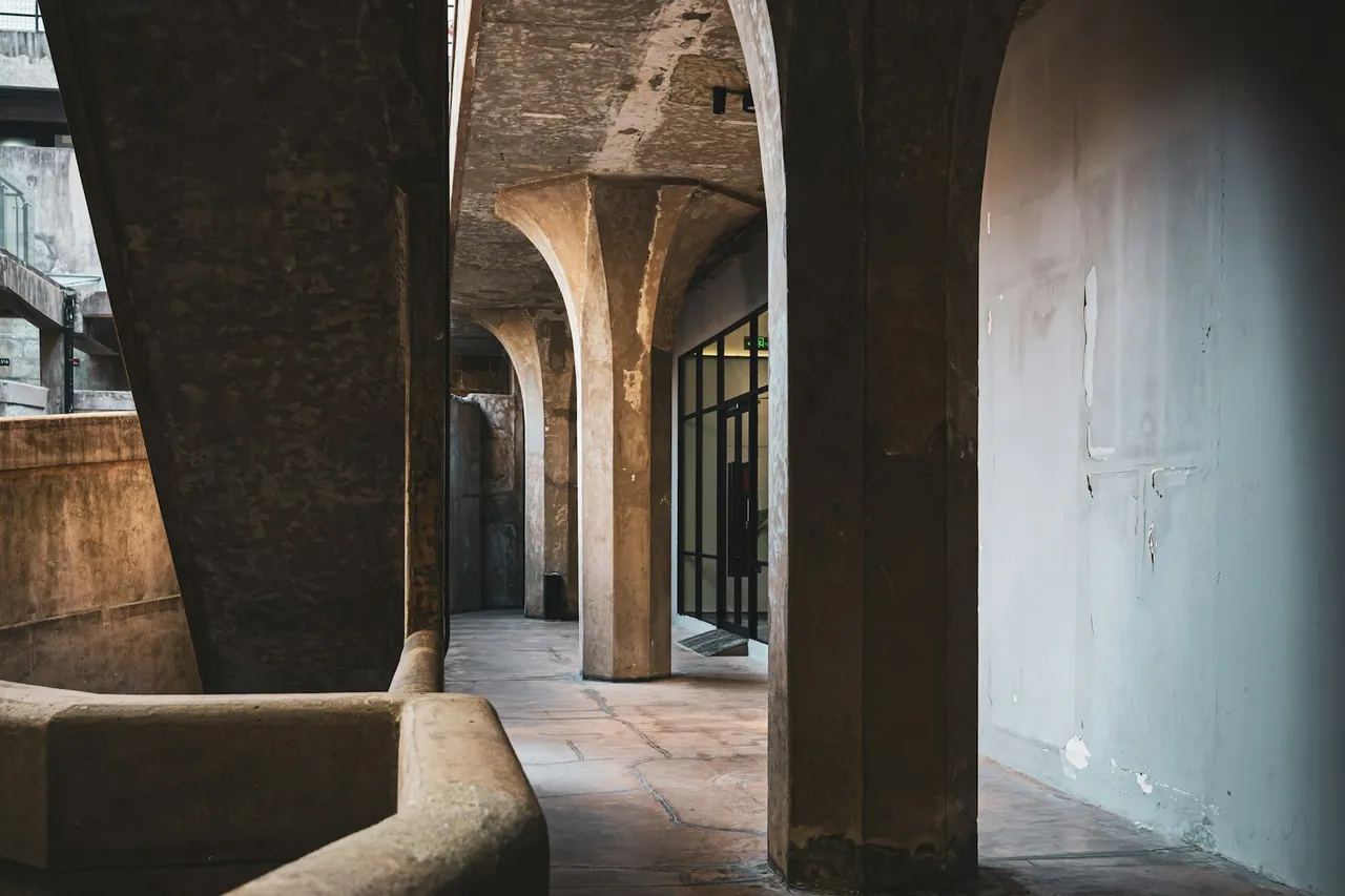 Sunlit concrete arches at 1933 Old Millfun in Shanghai